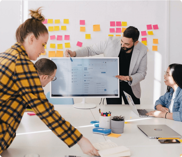 Team collaboration around desk